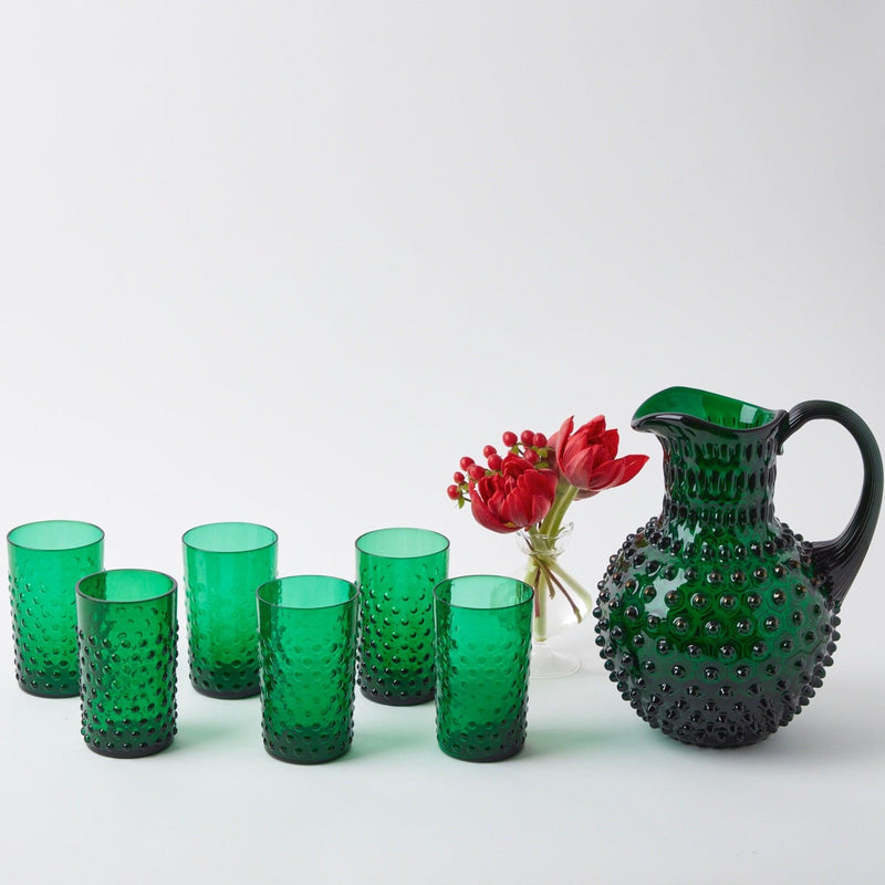 Add a touch of timeless Christmas style to your holiday table with the Emerald Green Hobnail Jug, ensuring your Christmas gatherings are coordinated and inviting while serving your favorite holiday beverages.