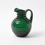 Elevate your Christmas gatherings with the sophisticated beauty of the Emerald Green Hobnail Jug - a symbol of holiday grace, ensuring your holiday beverages are served elegantly and with flair.