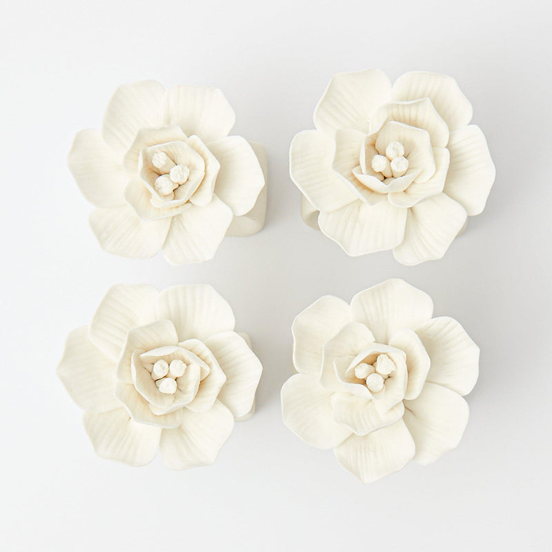 Set of 4 porcelain napkin rings featuring delicate Fiore designs.
