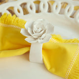 Fiore-themed porcelain napkin rings, a set of 4 for elegant table decor.