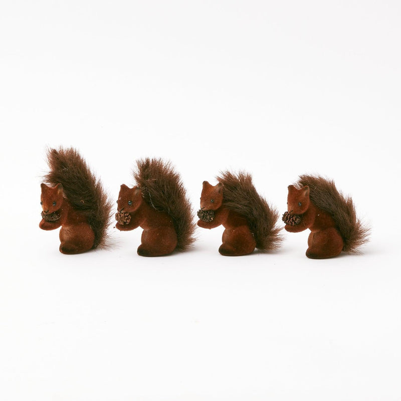 Transform any space into a haven of cuteness with the Flocked Baby Squirrels (Set of 4).