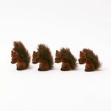 Introduce whimsical charm with the Flocked Baby Squirrels (Set of 4) for a playful touch.