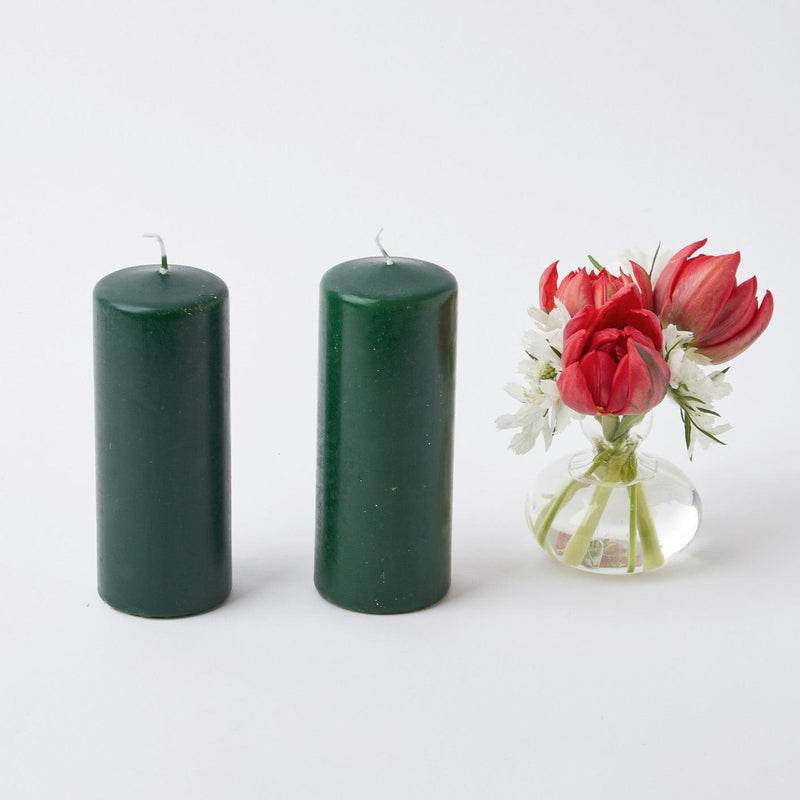 Add a touch of distinctive style to your home decor with the Forest Green Pillar Candle Pair, perfect for creating a unique and inviting atmosphere.