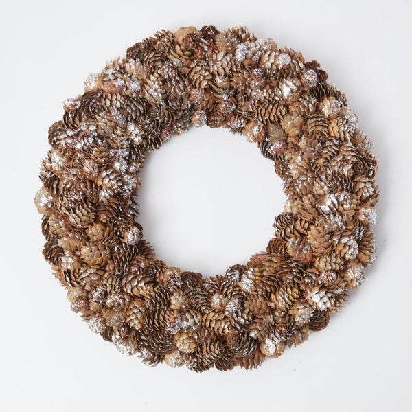 Elevate your decor with our Frosted Pinecone Wreath - a touch of natural elegance for your home.