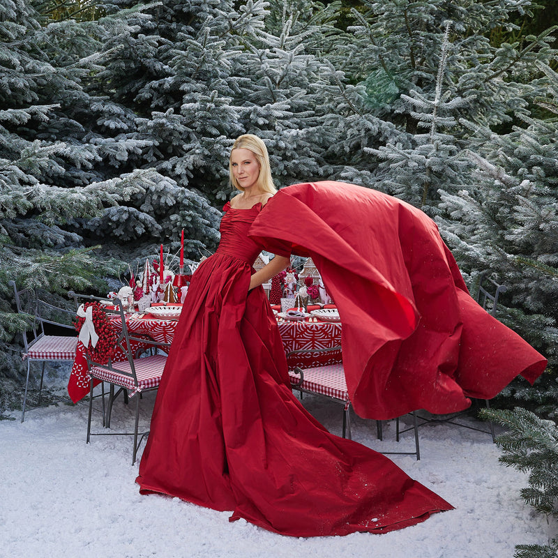 Brighten your holiday gatherings with the elegant presence of the Gretel Applique Red Tablecloth, perfect for creating a festive and inviting atmosphere that captures the magic of Christmas.