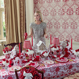 Brighten your Christmas gatherings with the elegant presence of the Beatrice Red Tablecloth, perfect for creating a festive and inviting atmosphere that captures the magic of the holidays.