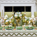Set a distinctive and trendy table with the Olive Green Ikat Tablecloth, adorned with a unique Ikat pattern that adds a modern flair to your dining occasions.