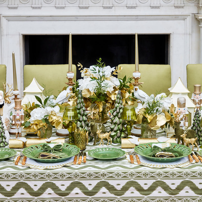 Set a distinctive and trendy table with the Olive Green Ikat Tablecloth, adorned with a unique Ikat pattern that adds a modern flair to your dining occasions.