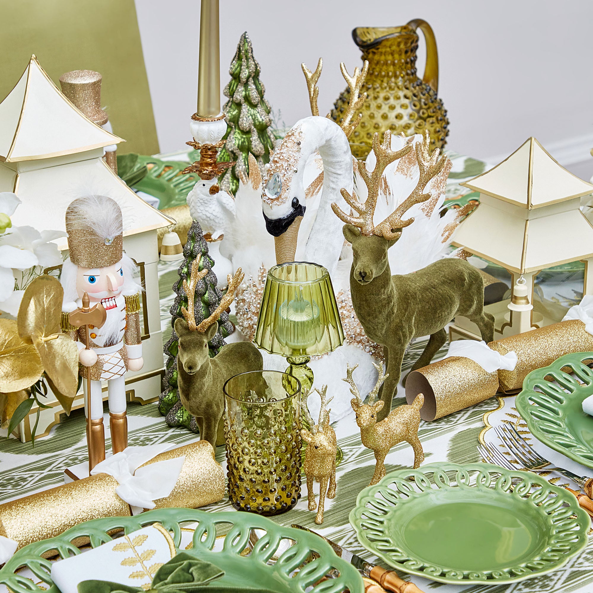 Create a festive and enchanting Christmas atmosphere with the Large Olive Green Flocked Reindeer Pair, perfect for infusing your space with rustic elegance.