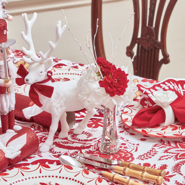 Transform your space into a winter wonderland with the White Flocked Reindeer Family, a captivating ensemble featuring velvety bows for an enchanting holiday atmosphere.