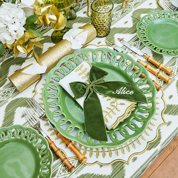 Impress your guests with the delightful charm of the Personalizable Forest Green Napkin Bow, an accessory that adds a touch of personalization and a dose of natural beauty to any dining occasion.