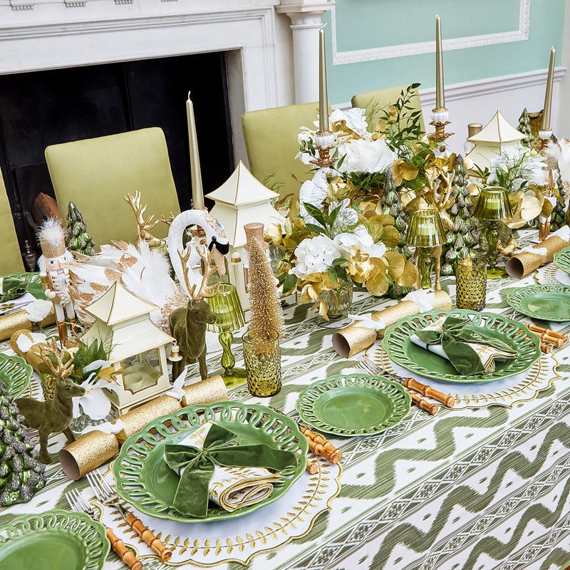 Start your contemporary dining traditions with the Olive Green Ikat Tablecloth, a chic and stylish tablecloth that adds a touch of elegance to your gatherings.