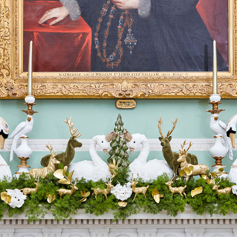 Create an enchanting ambiance for your winter gatherings with the A Winter's Tale Mantlescape, a stunning ensemble of decorations that bring the charm of the season to your mantle.