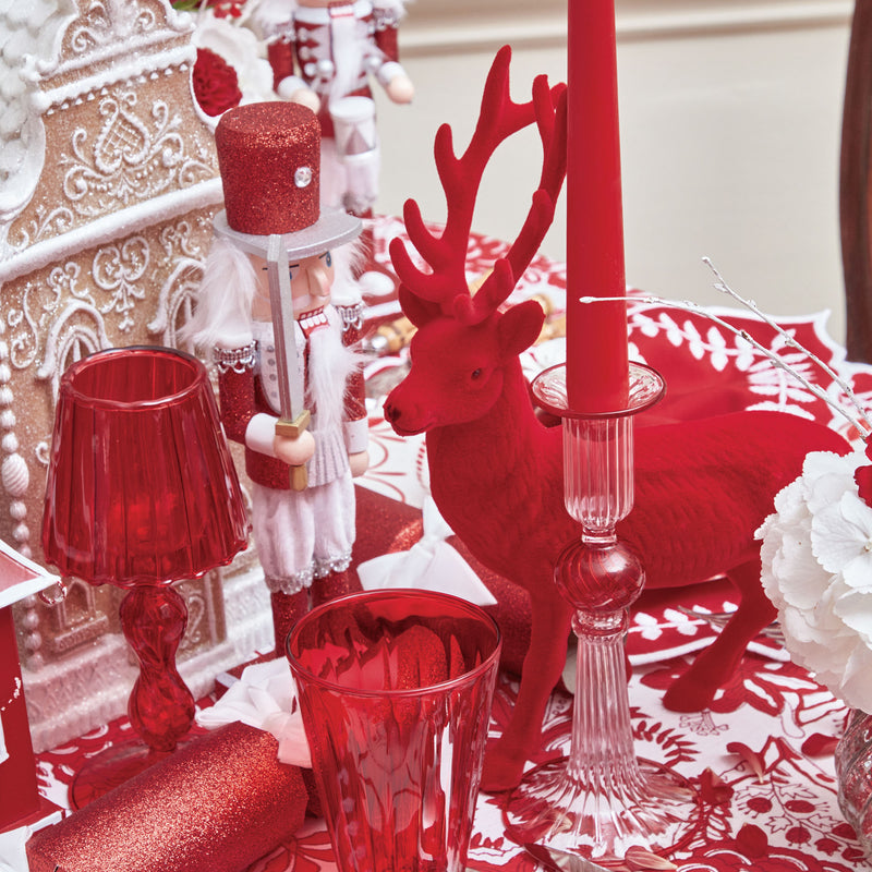 Enhance your holiday decor with the delightful and whimsical Red Flocked Reindeer Family, adding a touch of tradition and festive spirit to your Christmas festivities.