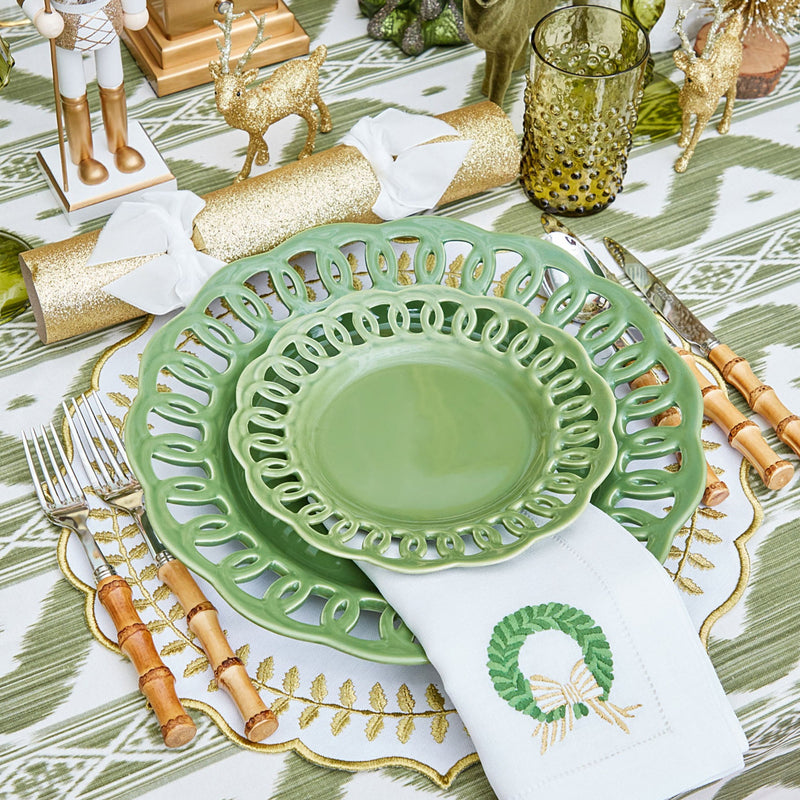 Create a memorable dining experience with the Green Lace Starter Plates Set of 4, designed to bring sophistication and charm to your table.