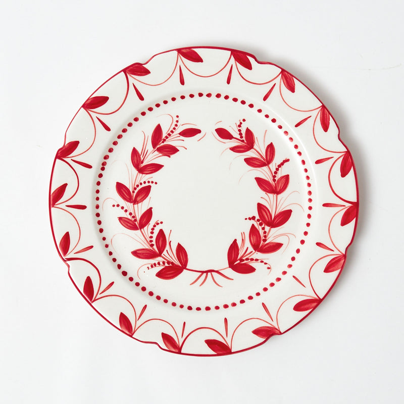 Add a touch of holiday opulence to your dining experience with the Elizabeth Red Garland Dinner Plate, an elegant plate that radiates the spirit of Christmas and transforms your table into a festive masterpiece.