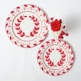 Adorn your table with the timeless charm of the Elizabeth Red Garland Dinner & Starter Plates.