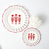 Experience the joy of holiday dining with White Lace Nutcracker plates.
