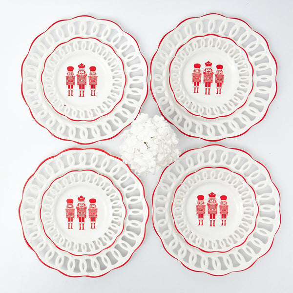 Embrace the holiday spirit with White Lace Nutcracker Dinner & Starter Plates.