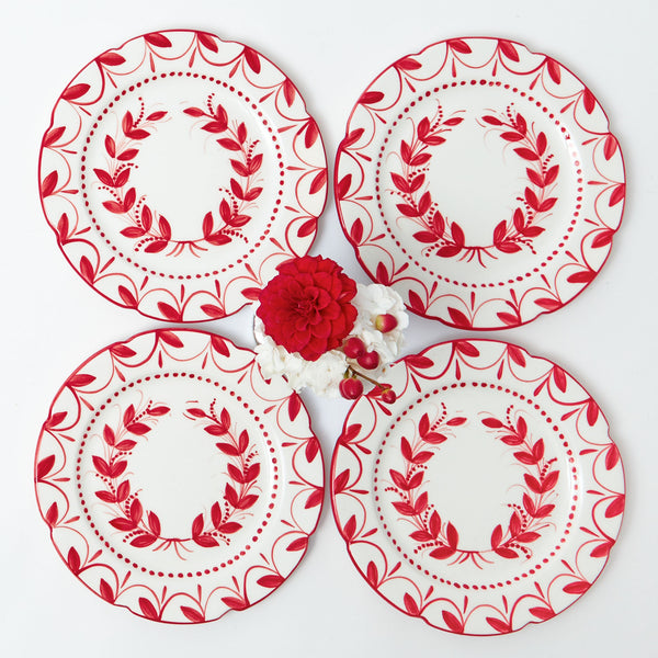 Transform your holiday dining with Elizabeth Red Garland Dinner Plates (Set of 4).