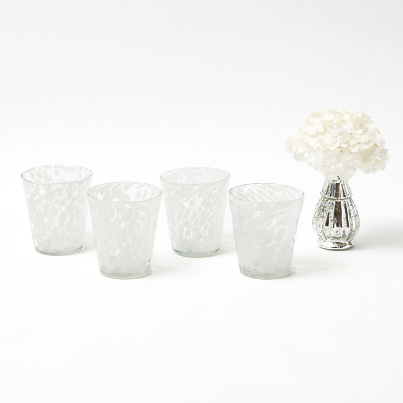 Elevate your glassware collection with our Dappled White Water Glasses (Set of 4) - a blend of elegance and functionality.