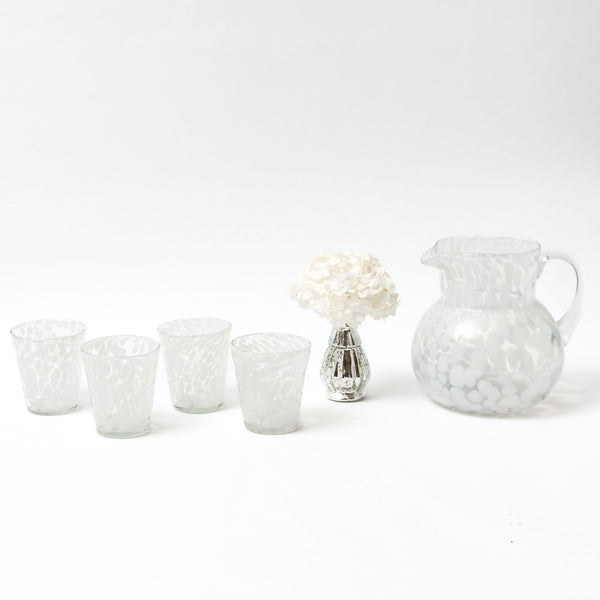 Elevate your Christmas table setting with our Dappled White Glasses & Jug Set - a stunning addition to your holiday gatherings.