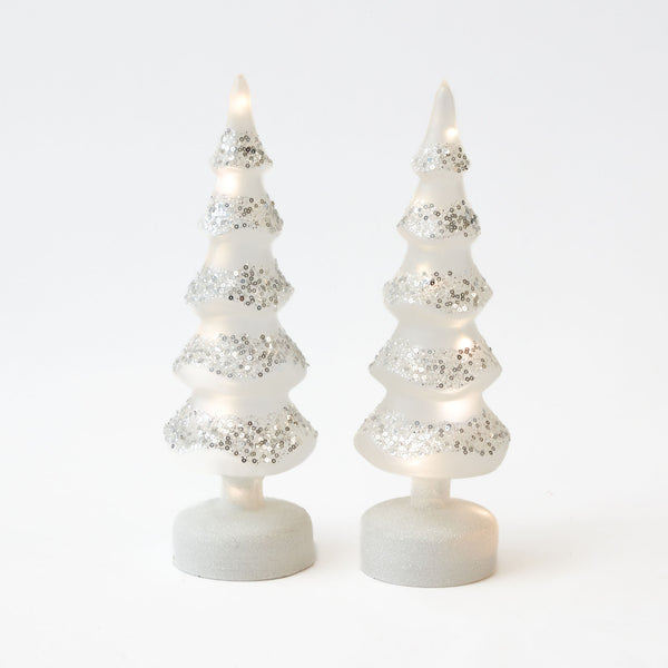 Elevate your holiday decor with the Pre-lit White Glitter Christmas Tree Pair, a dazzling and convenient duo that brings the magic of the season to life.