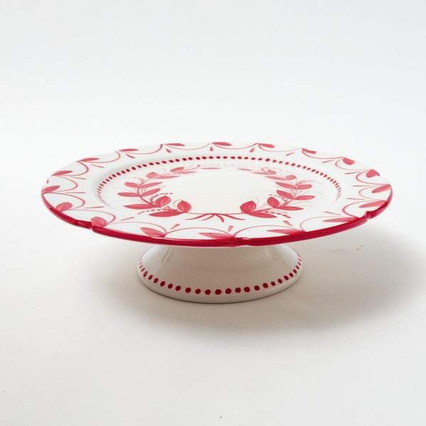 Elevate your dessert presentation with the Red Elizabeth Garland Cake Stand, a festive addition that adds a touch of elegance and holiday charm to your sweet treats.
