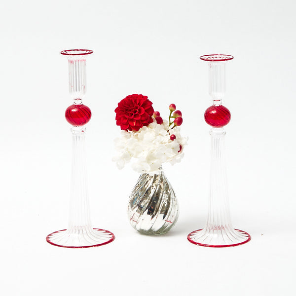 Elevate your decor with the Paulette Red Candle Holders (Pair), exuding timeless elegance and charm. Illuminate your space in style.