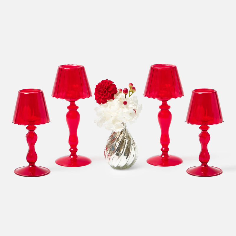 Cast a warm and inviting glow in your home with the Red Glass Lantern Tea Light Holder Pair, two 24 cm lanterns that create a charming and enchanting atmosphere.
