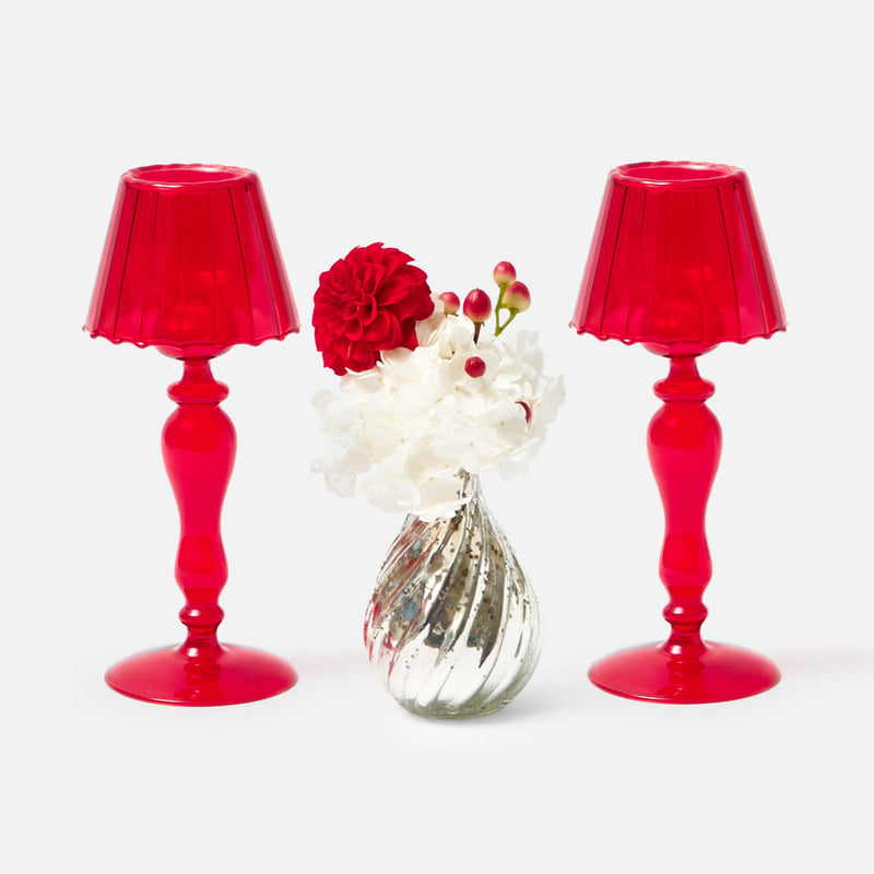 Welcome the beauty of candlelight with the Red Glass Lantern Tea Light Holder Pair, two 24 cm lanterns that enhance your space with their enchanting glow.