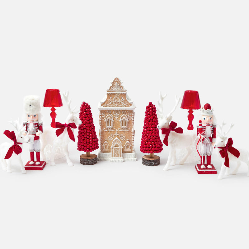 Turn any Christmas into a magical affair with our Red Glitter Nutcracker Trio.