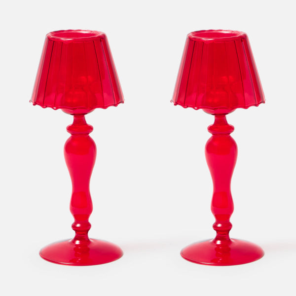 Illuminate your space with the Red Glass Lantern Tea Light Holder Pair, a delightful duo of 24 cm lanterns that cast a warm, inviting glow for a cozy ambiance.