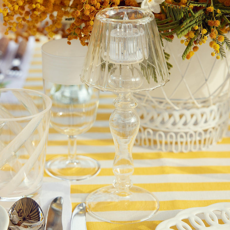 Make your living space more inviting with the playful charm of the Glass Lantern Tea Light Holders, a pair that captures the spirit of cozy ambiance and adds a touch of elegance to your decor.