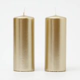 A pair of elegant Gold Pillar Candles for your decor.