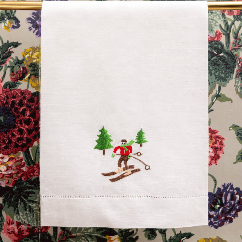 Turn your bathroom into a winter wonderland with the Embroidered Skier White Linen Hand Towel, an elegant and wintery piece that enhances your space with a touch of seasonal charm.