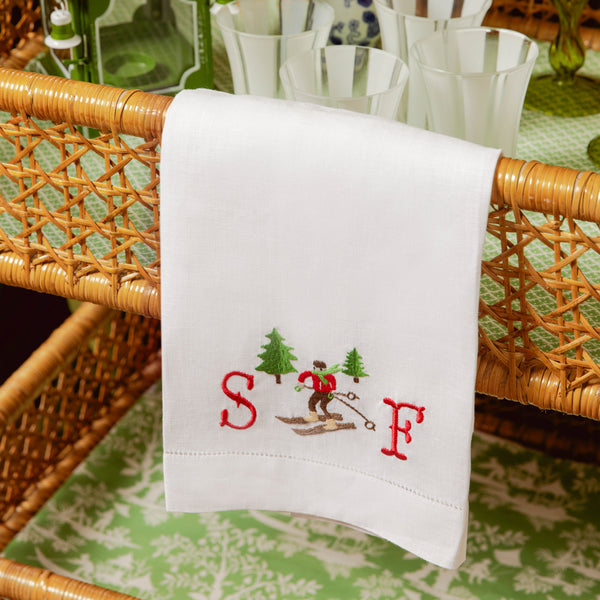 Add a touch of winter magic to your bathroom with the Embroidered Skier White Linen Hand Towel, adorned with a charming embroidered skier design that captures the spirit of the season.