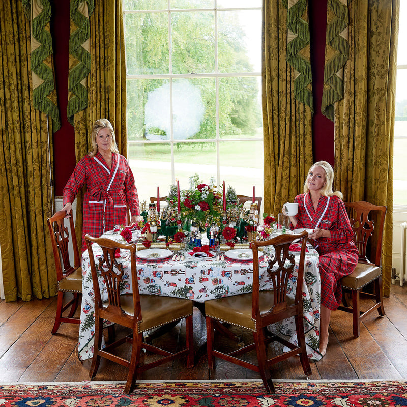 Elevate your downtime with the warmth and charm of the Red Tartan Frilled Dressing Gown - a simple yet stylish choice for cozy evenings at home.