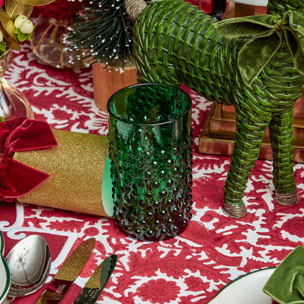 Add a touch of festive elegance to your holiday decor with the Emerald Green Hobnail Glass Set, perfect for creating a sophisticated and inviting atmosphere.