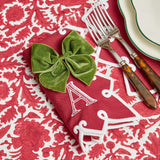 The Angelina Red Berry Placemats & Napkins create a warm and inviting holiday ambiance.