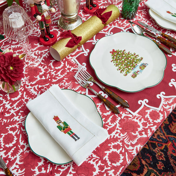 Add a touch of festive elegance to your table settings with these embroidered napkins.