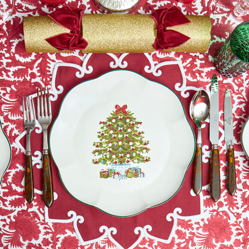 Enhance your Christmas decor with the playful and delightful Mrs. Alice Christmas Tree Dinner Plate, designed to bring a touch of tradition and whimsy to your holiday feasts.
