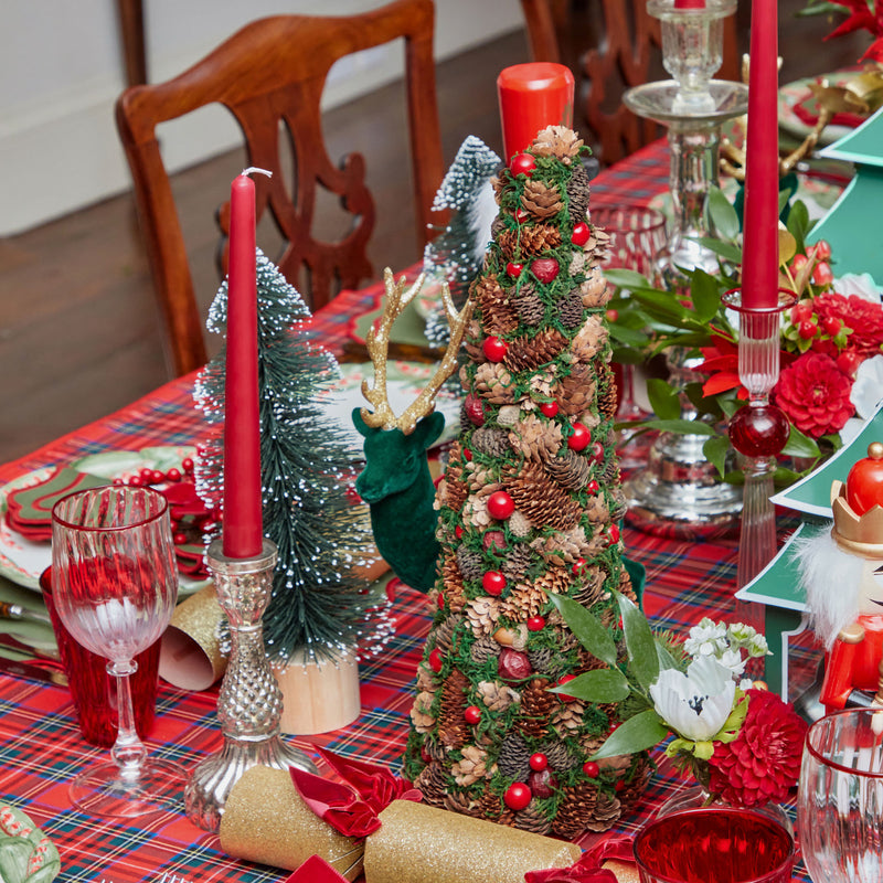 Add a touch of woodland enchantment to your holiday celebrations with the Pinecone and Berry Tree, perfect for infusing your space with the rustic elegance and festive cheer of the season.