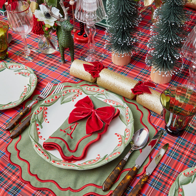Create a festive atmosphere with our Ruby Red Velvet Napkin Bows - the perfect complement to your holiday meals.