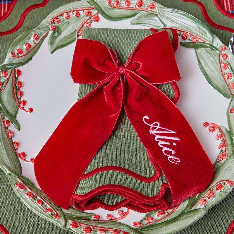 Add a unique and festive flair to your table decor with the Personalisable Berry Red Napkin Bow, featuring the option to personalize with your name or message.