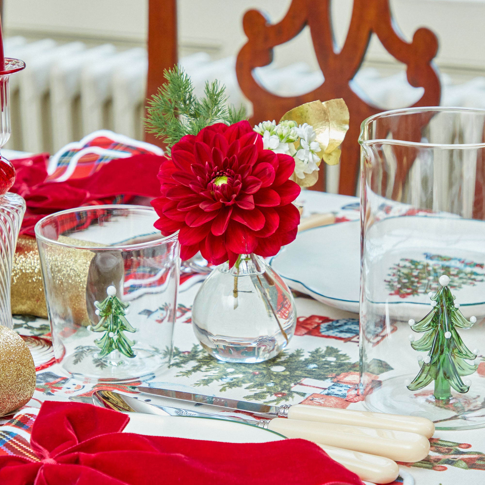 The Christmas Tree Jug and Glasses Set is perfect for serving your favorite beverages during the holidays.