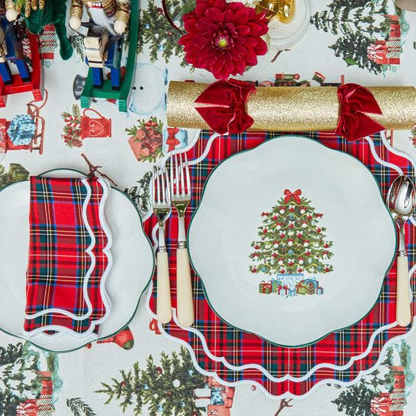 Elevate your dining experience with Katherine Tartan Placemats & Napkins – a timeless set for holiday feasts.