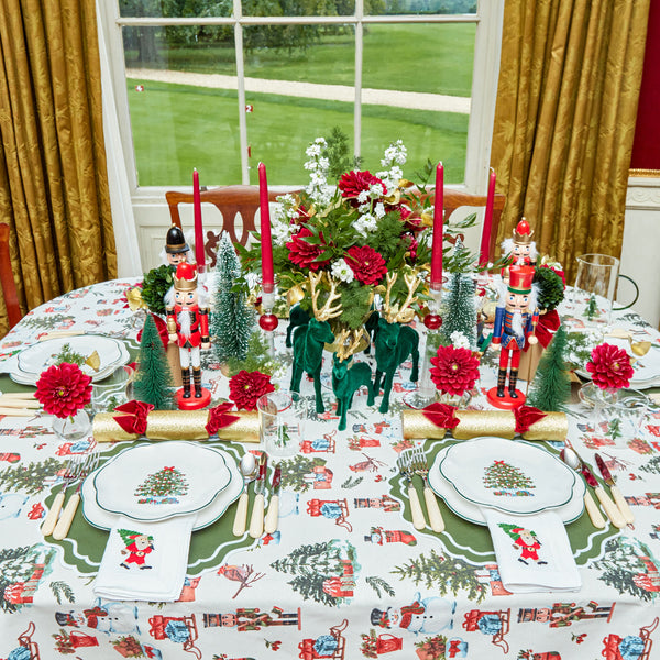 This exquisite dinnerware set captures the festive spirit with its intricate Christmas tree design.
