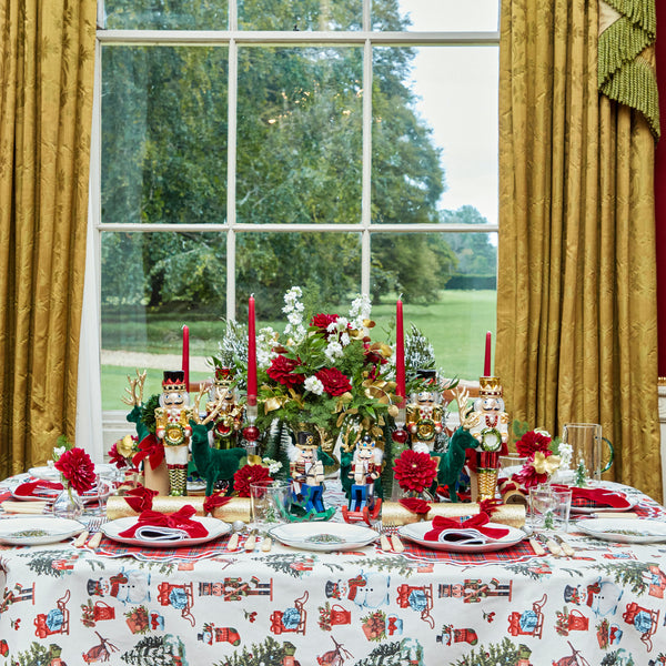 Create a whimsical and cheerful Christmas table with the Jolly Snowman Tablecloth, adorned with a delightful snowman pattern that embodies the joy of the season.