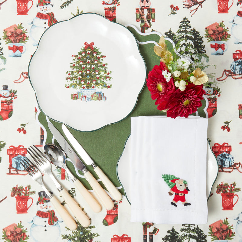 Enhance your holiday decor with the intricate beauty of the White Hand Embroidered Father Christmas Napkins, adding a touch of tradition and craftsmanship to your Christmas festivities.